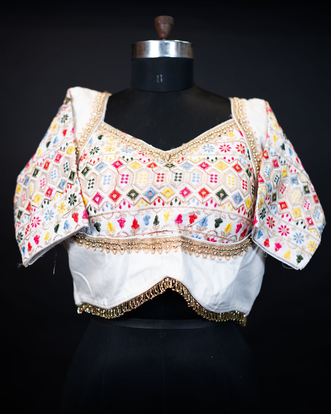 White Multicolour Geometric Embroidered Blouse — front view