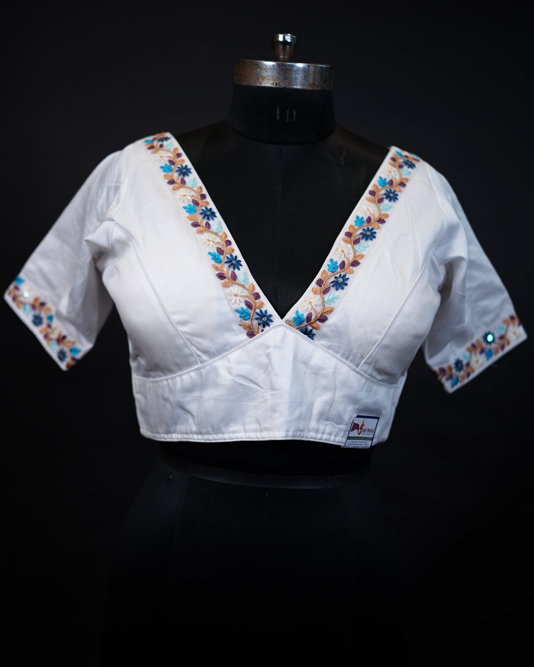 White V-Neck Floral Vine Embroidered Blouse — front view